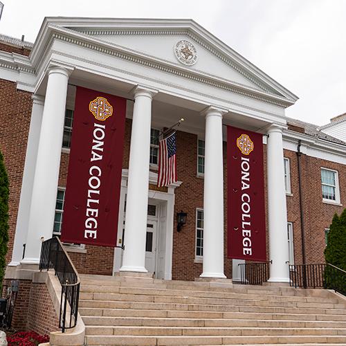 The front entrance of McSpedon Hall with the new banners.