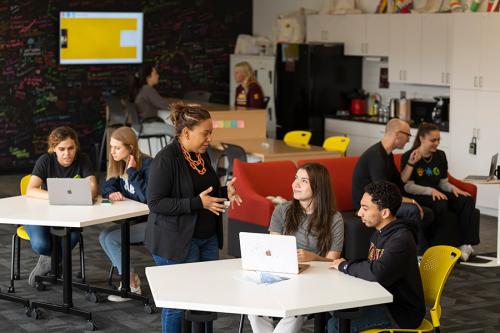 Lendynette works with students at the Hynes Institute.