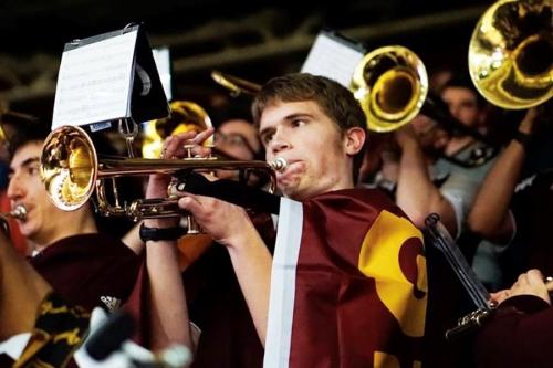 A trumpet player in the pep band.