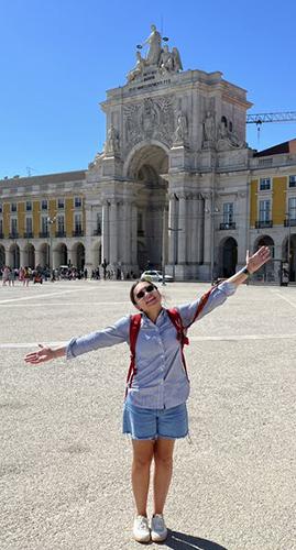 Leah Figueroa in a city square in Portugal.