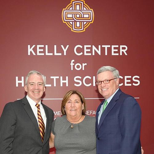 President Carey with Peggy and Al Kelly.