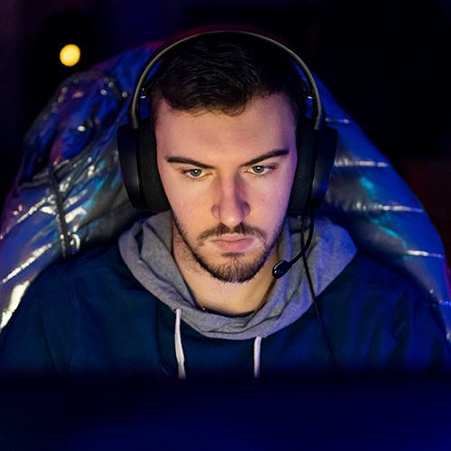 An Esports player concentrates while playing.