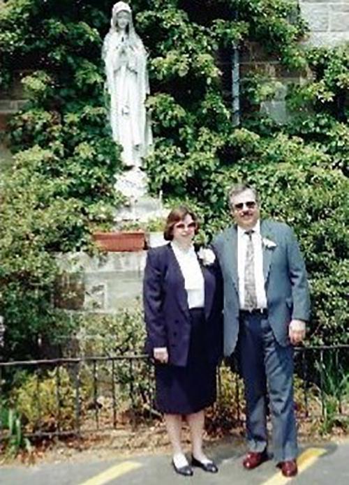 Patricia D. Castellano ’94 and Gaetano P. Castellano ’87 with a statue of Mary, taken on their 25th wedding anniversary. 