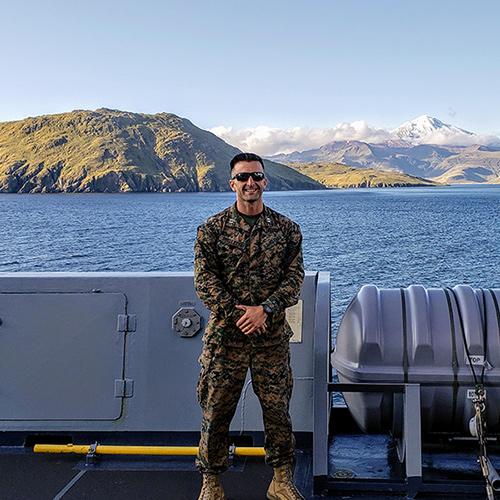 Jesse A. Ouellette aboard a military ship.