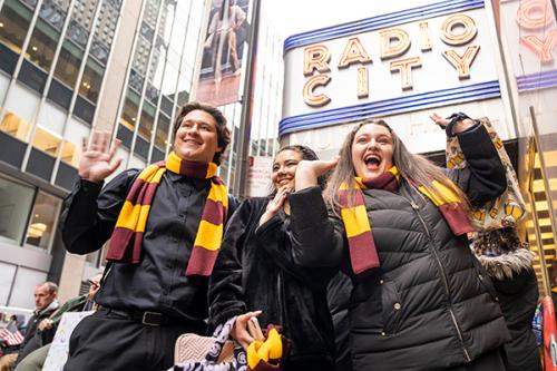 Members of the Iona Singers outside of Radio City Music Hall.