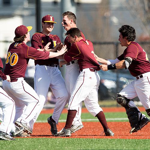 Iona men's baseball team celebrate a win on the field.