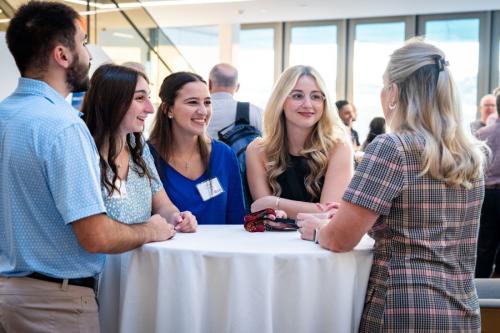 Students networking at LaPenta School of Business Event
