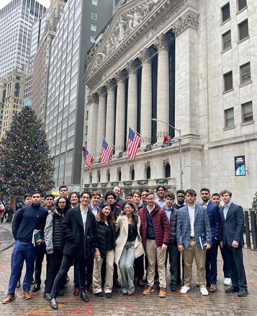 Students outside of the NY Federal Reserve.