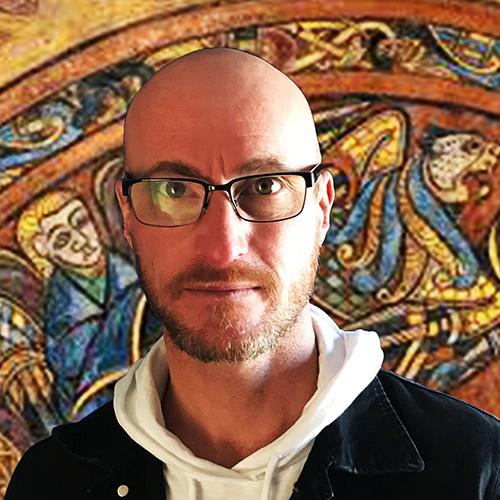 Dr. Thiery in front of the Book of Kells.