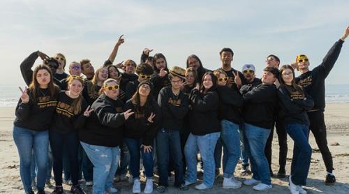 The pep band smiles on the beach at Atlantic City.