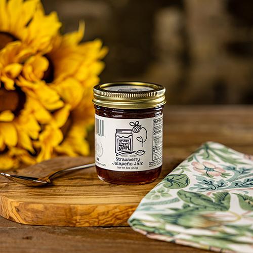 A jar of Sticky Spoons Strawberry Jalapeno jam.