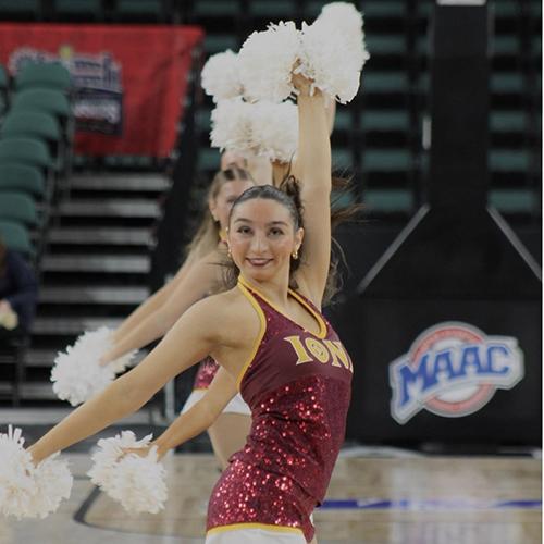 Iona Dance Team in sync, performing the same dance move at the MAAC.