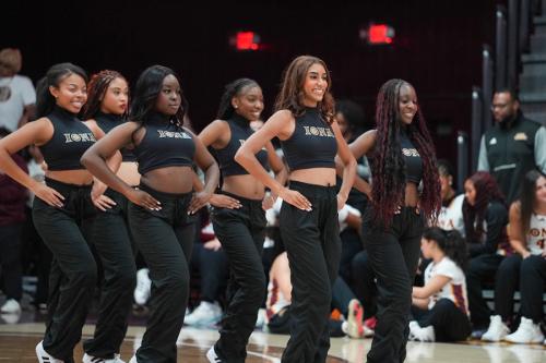 Iona University Gold Line dancing in Maroon Madness.