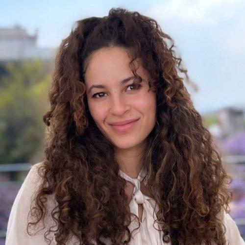 Jeanelle Santoro's headshot.