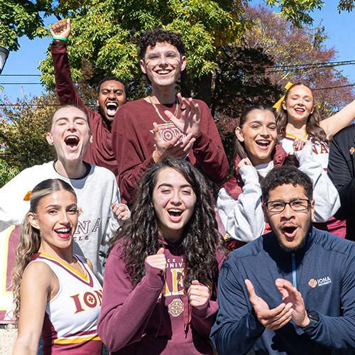 Students cheer in the stands at Mazzella Field.