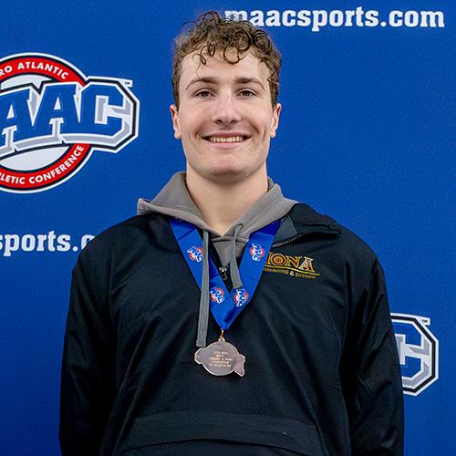 Nate with his MAAC medal.