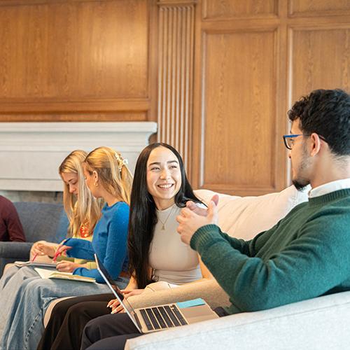 Students talk in Burke Lounge.