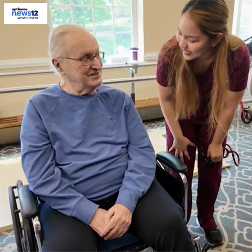 An Iona nursing student works with a patient at The Osborn.