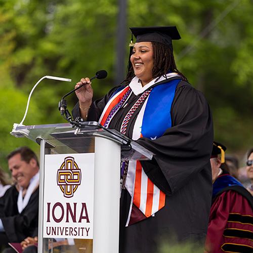 Krisna Rivera speaking at the Commencement.
