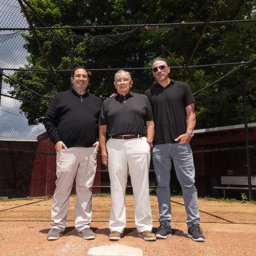 Coach Al Zoccolillo with his two sons.
