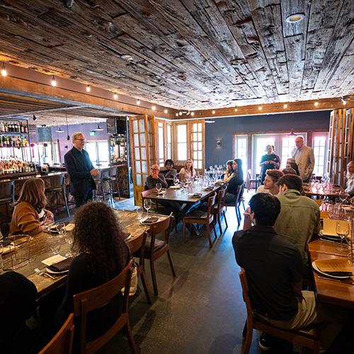 Students gather in one of John Crabtree's restaurants.