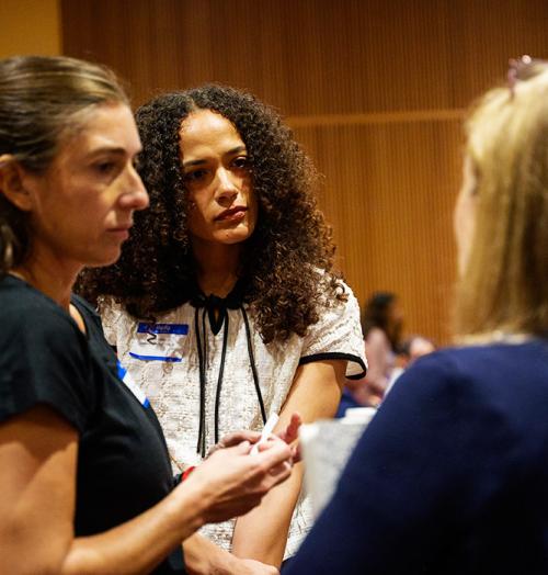 Three educators discuss AI in the classroom at the conference. 