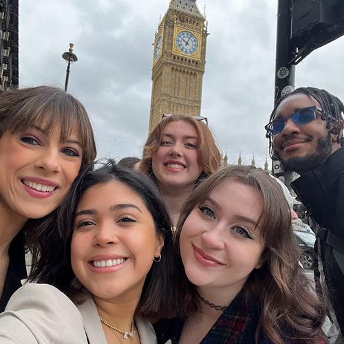 Kerri Shea and friends in London with Big Ben in the background.