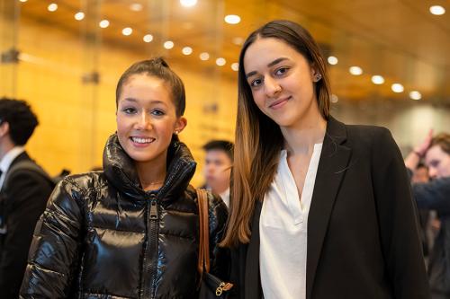 Two students in the sales minor program smile.