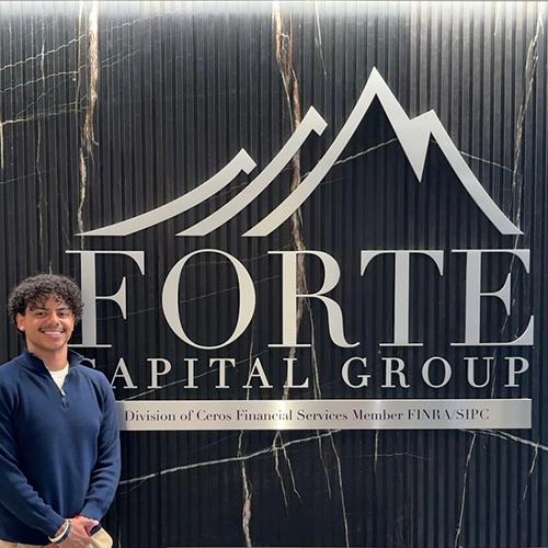 Iona student Carlos Gomez at his internship at Forte Capital Group.