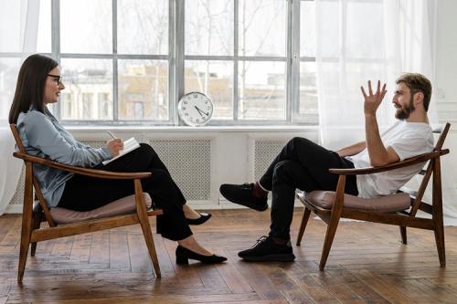 A Mental Health counselor works with a client.
