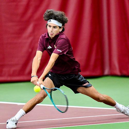 A student-athlete stretches to return a shot as Iona men’s and women’s tennis begin a new chapter in Gaels athletics.