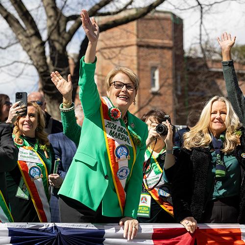 Maggie Timoney waves at the 2024 St. Patrick's Day parade.